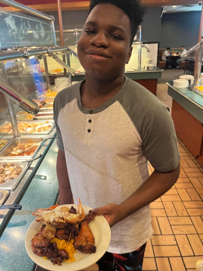 Young black man at a Chinese buffet.